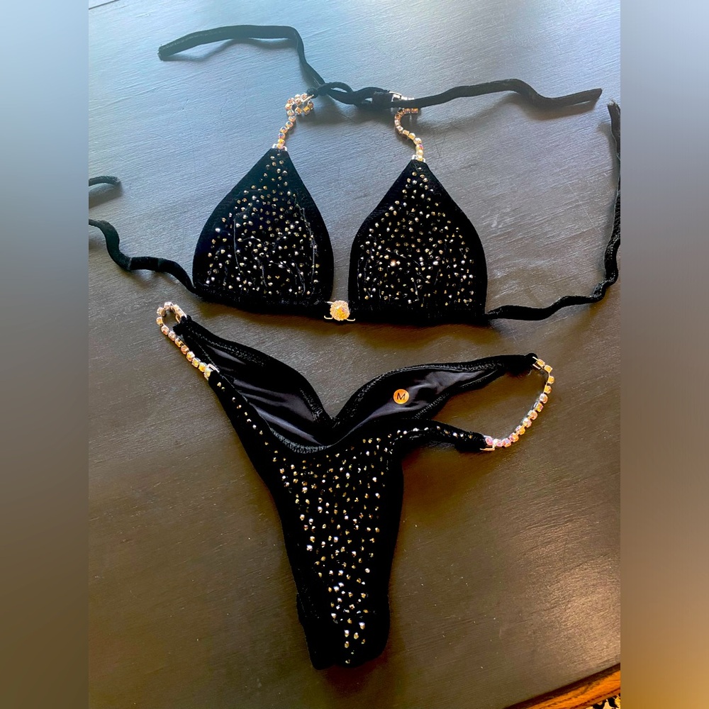 Striking black velvet competition bikini NPC bodybuilding